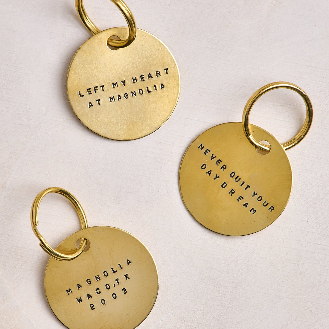 Never Quit Your Daydream Brass Keychain