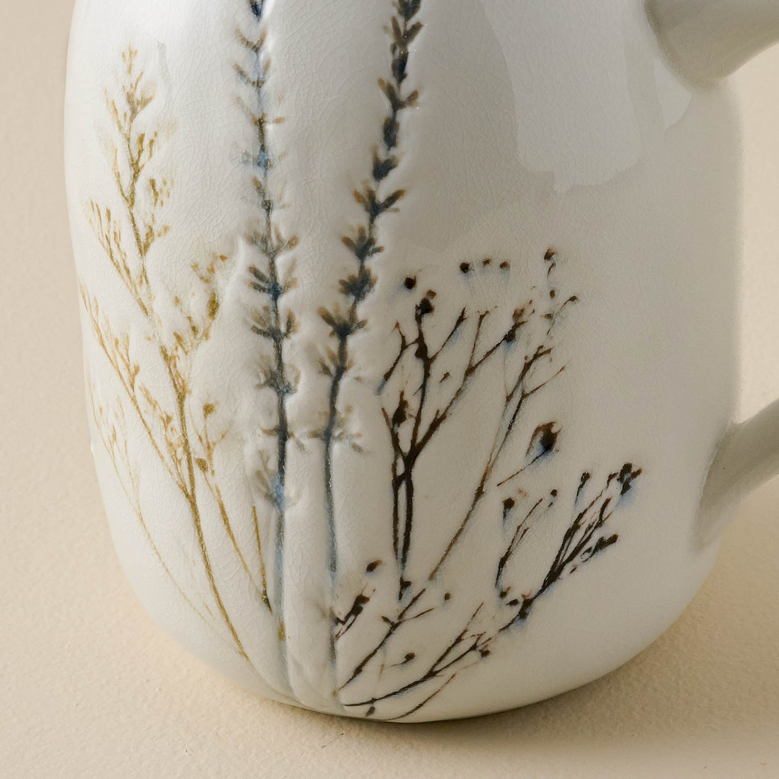 Pressed Floral Ceramic Pitcher